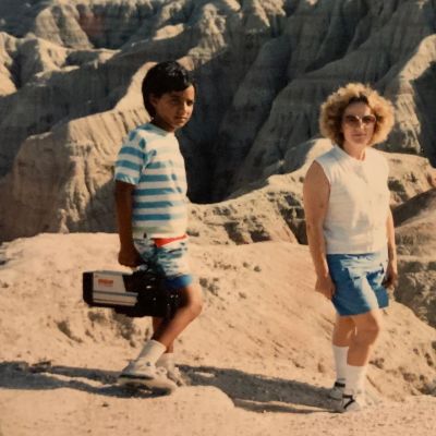 A young Daniel Pudi with his mother while  on vacation.